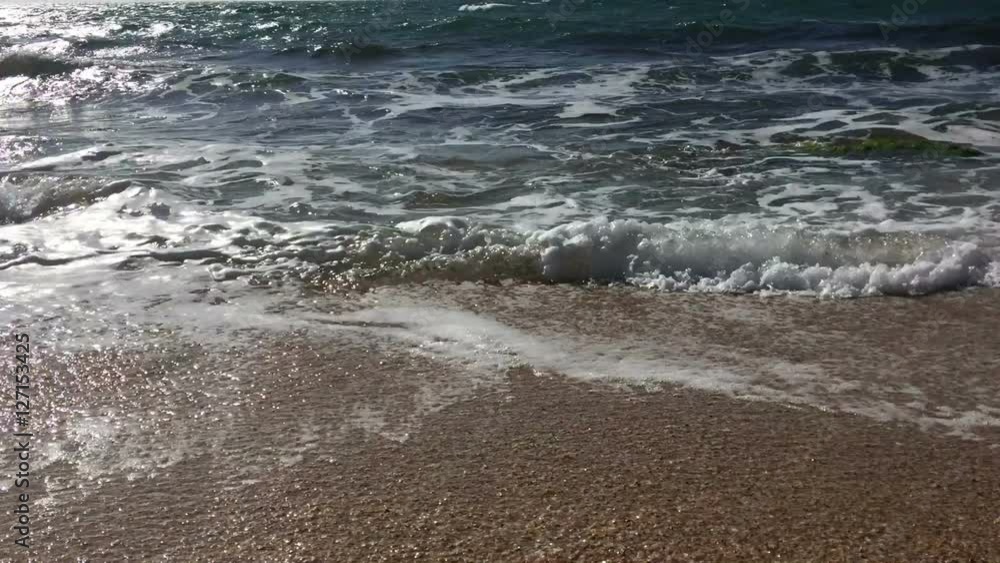 Soft wave of blue ocean on sandy beach. Soft wave of blue ocean on sandy beach.