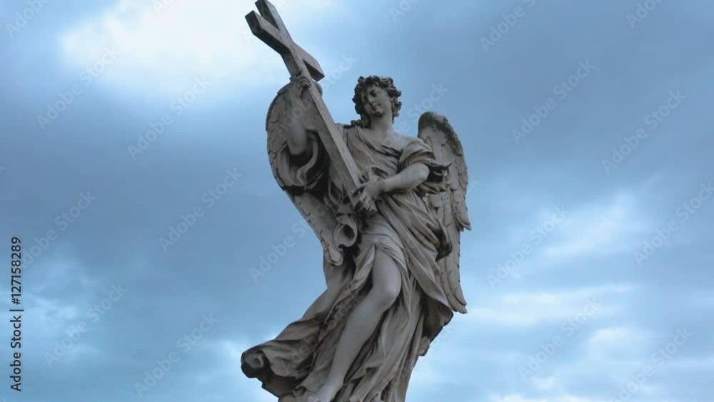 Statue of an Angel in Rome - filmed against the sky Statue of an Angel in Rome - filmed against the sky