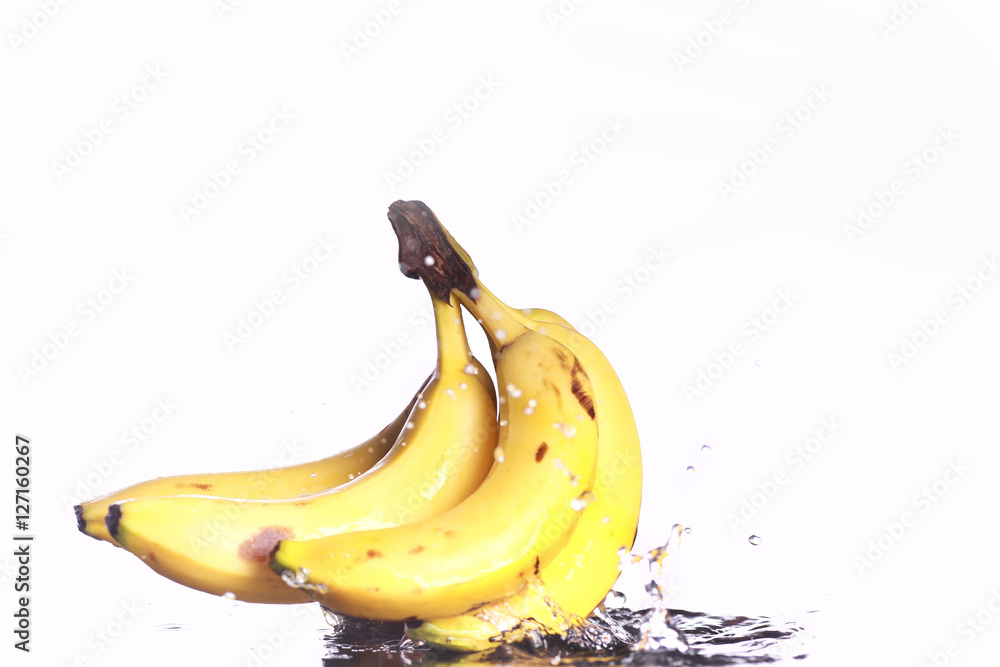 fresh banana with splashing water