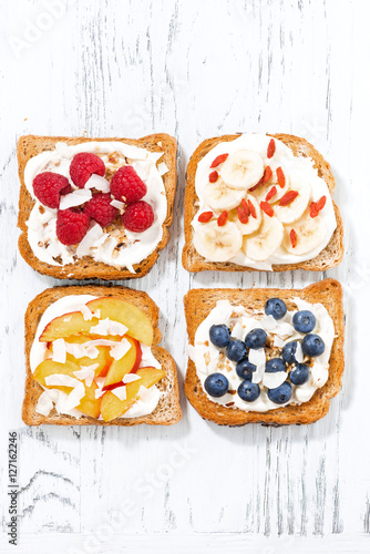 sweet toast with different toppings  top view  vertical