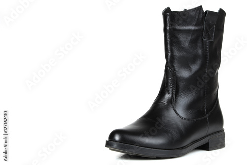 Female black boots isolated on a white background. © Studio KIVI