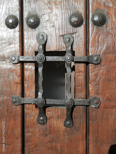 wooden door with peep hole