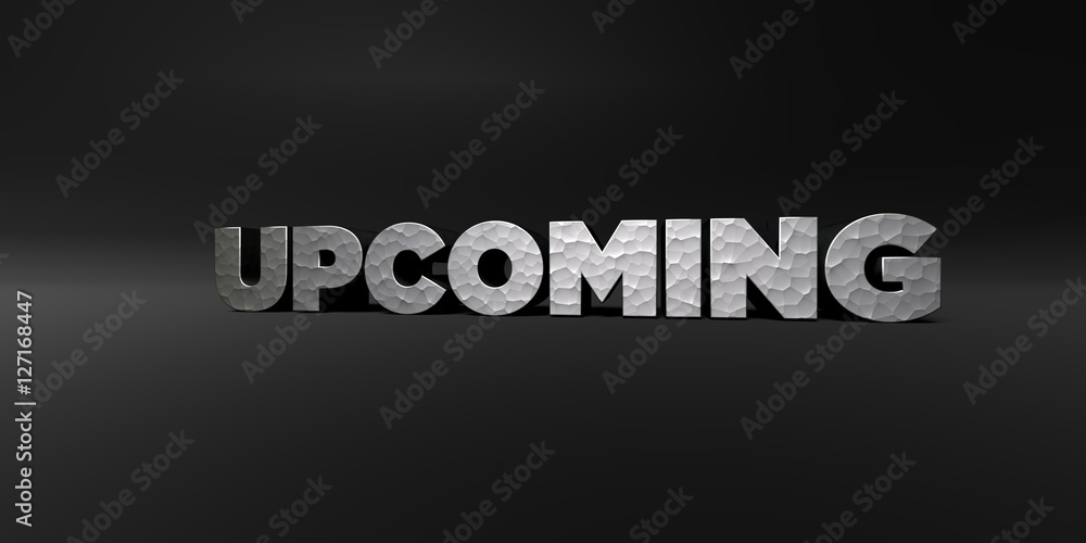 UPCOMING - hammered metal finish text on black studio - 3D rendered royalty free stock photo. This image can be used for an online website banner ad or a print postcard.