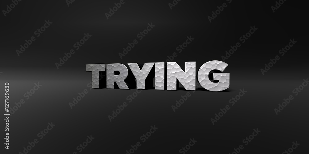 TRYING - hammered metal finish text on black studio - 3D rendered royalty free stock photo. This image can be used for an online website banner ad or a print postcard. TRYING - hammered metal finish text on black studio - 3D rendered royalty free stock photo. This image can be used for an online website banner ad or a print postcard.