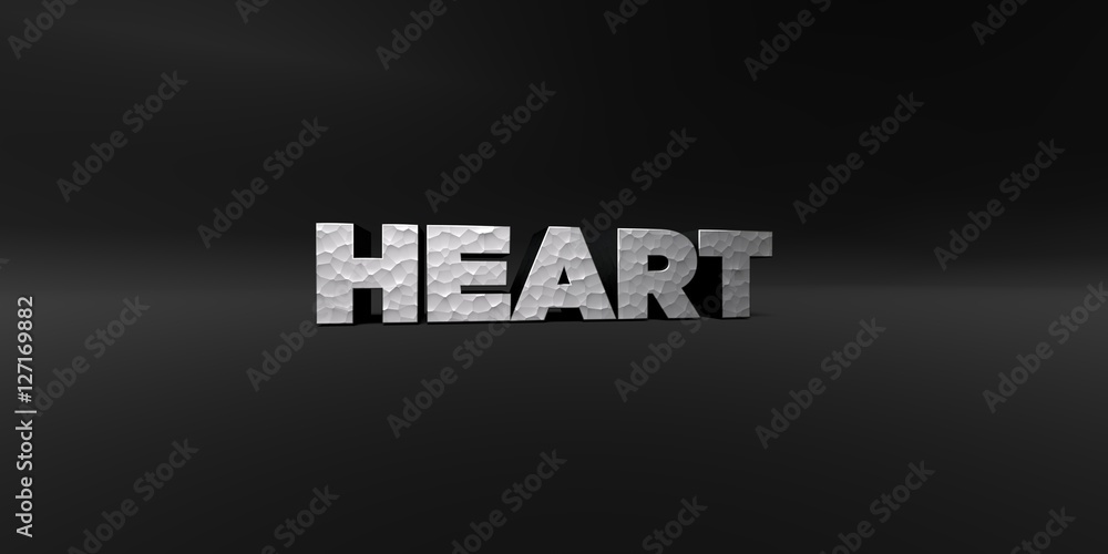 HEART - hammered metal finish text on black studio - 3D rendered royalty free stock photo. This image can be used for an online website banner ad or a print postcard.