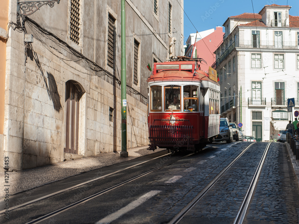Street in Lisbon with tram passing Street in Lisbon with tram passing