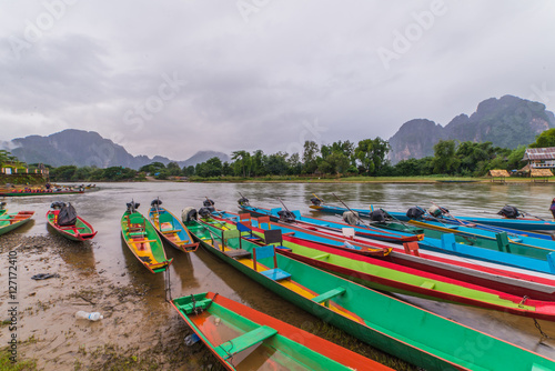 long tail boats on Song river, Vang Vieng, Laos