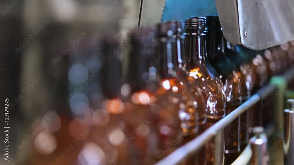 plastic bottles on conveyor line plastic bottles on conveyor line