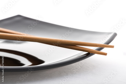 empty sushi set, plateaus and chopsticks isolated on white background