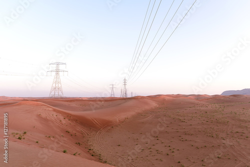 Electric Power Grid in Sand Desert, in Sharjah, United Arab Emirates,