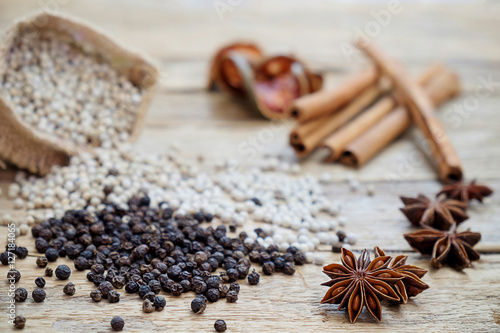 Spices and herbs for cooking background. Group of spices on wooden background and selective focus.