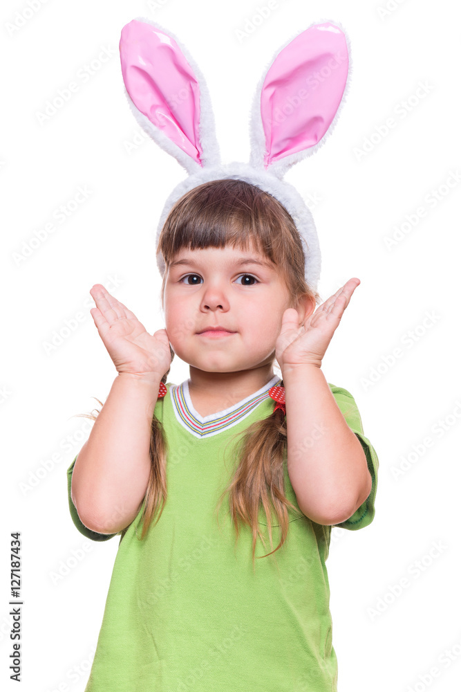 Happy little girl with pink rabbit ears. Portrait of cute caucasian baby wearing bunny ears. Funny preschool child, isolated on white background. Healthy carefree kid - Easter holidays concepts. Happy little girl with pink rabbit ears. Portrait of cute caucasian baby wearing bunny ears. Funny preschool child, isolated on white background. Healthy carefree kid - Easter holidays concepts.