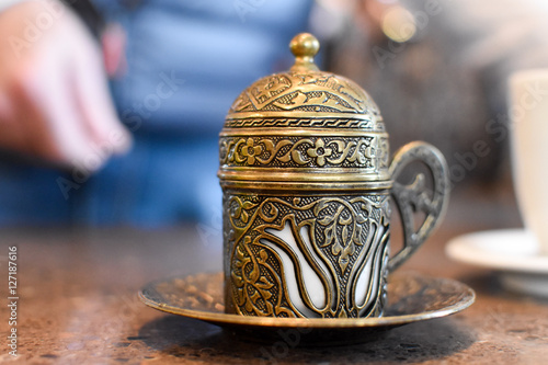 Traditionally ornamented coffee cup