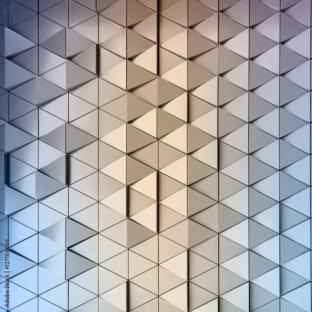 Abstract close-up view of modern aluminum ventilated triangles on facade Abstract close-up view of modern aluminum ventilated triangles on facade