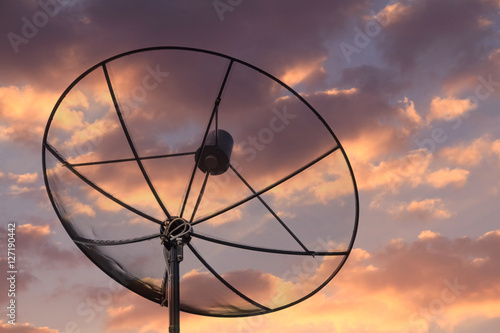 satellite dish with sunset sky background