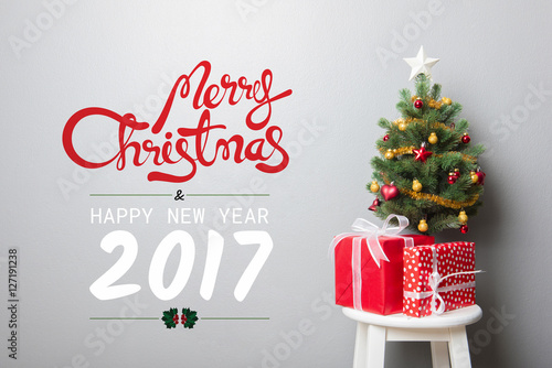 MERRY CHRISTMAS and HAPPY NEW YEAR 2017 text on the wall
