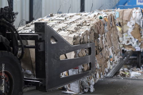 Waste paper at recycling yard photo