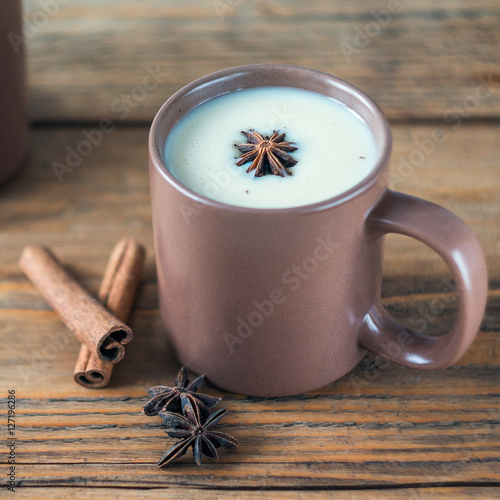 Traditional Indian Masala tea. Spiced tea with milk. Square