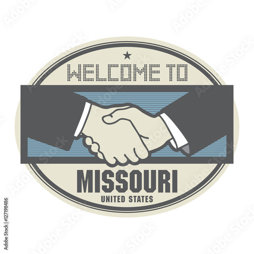 Business concept with handshake and the text Welcome to Missouri