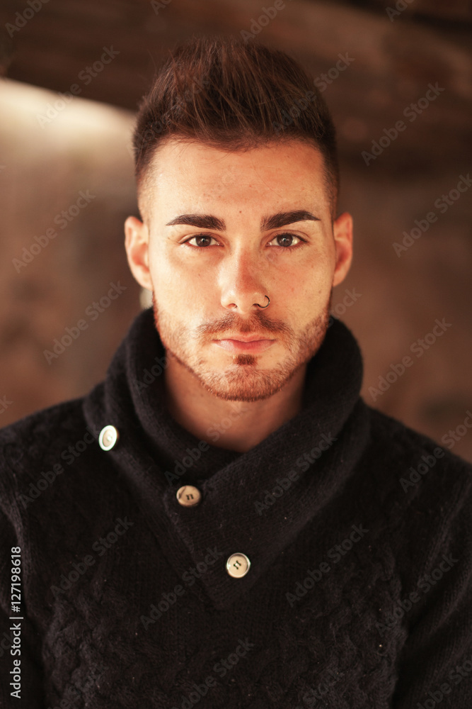 Obraz premium Portrait of attractive guy in a old house