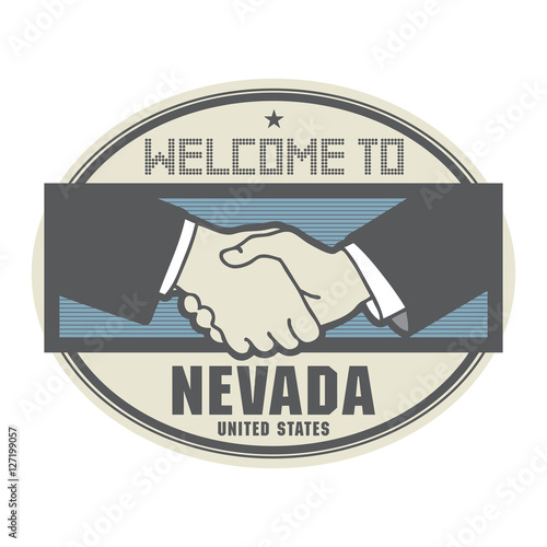 Business concept with handshake and the text Welcome to Nevada,