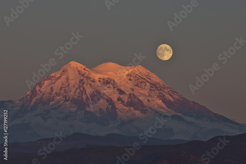 Moonrise  at sunset over Mt Rainier