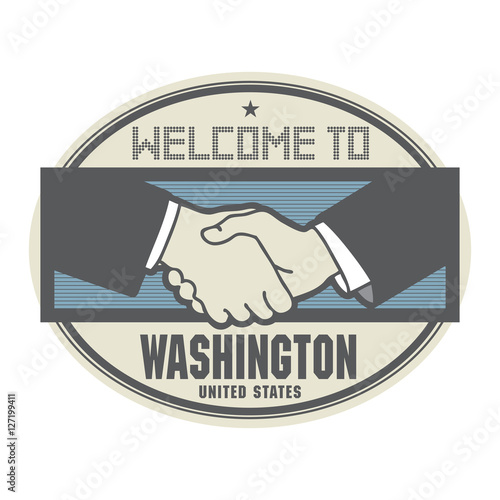 Business concept with handshake and text Welcome to Washington