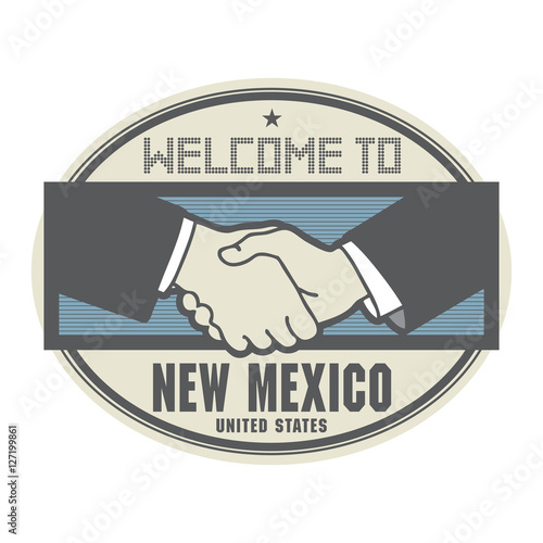 Business concept with handshake and text Welcome to New Mexico