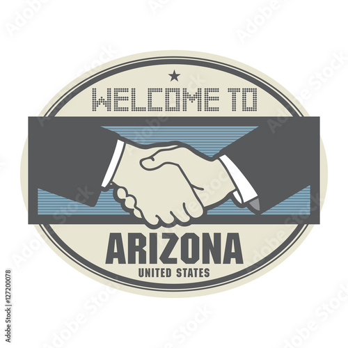 Business concept with handshake and the text Welcome to Arizona,