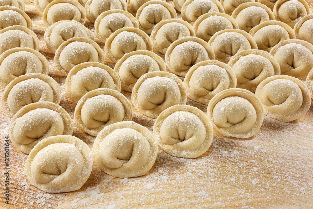 Dumplings and parsley - russian pelmeni - italian ravioli Dumplings and parsley - russian pelmeni - italian ravioli