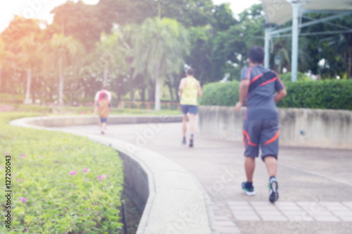 Blurred or De-focus man jogging in the park with gradient effect,Fitness concept.