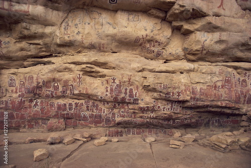 Decorated cliff wall at Dogon ritual site, Songo Village, Bandiagara Escarpment, Dogon Area, Mali photo