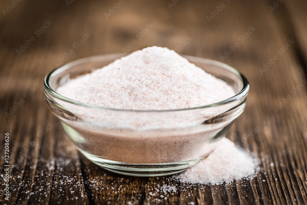 Portion of Himalayan Salt on wooden background (selective focus) Portion of Himalayan Salt on wooden background (selective focus)