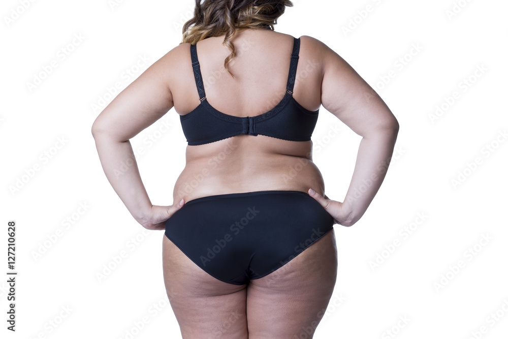Plus size model in black lingerie, overweight female body, fat woman with  cellulitis on buttocks isolated on white background Stock Photo
