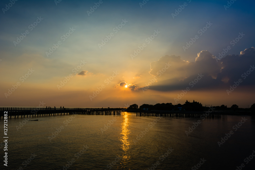 Silhouettes Sunset by the sea coastal Bangkok, Thailand