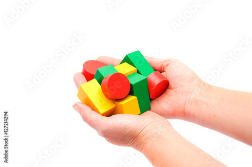 Wallpaper Mural Hand with wooden blocks isolated on white background. Torontodigital.ca