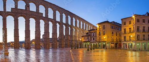 SEGOVIA, SPAIN, APRIL - 13, 2016: Aqueduct of Segovia and Plaza del Azoguejo at dusk.