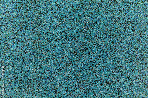 Abstract turquoise background rough surface of porous stone