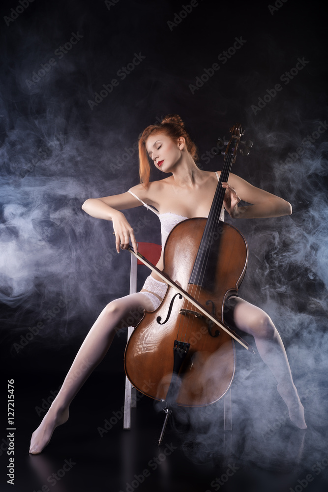 She plays the cello in the smoke