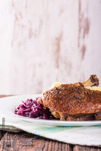 Portion of duck breast with red cabbage and crispy skin