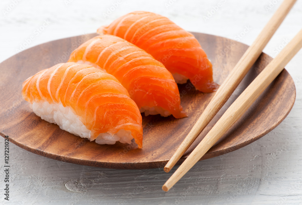 Three fresh salmon Nighiri sushi Three fresh salmon Nighiri sushi