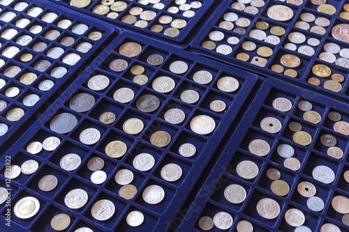 Plates with old coins collection