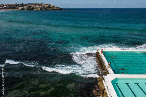 Photography People swimming at the famous Bondi Beach Icebergs swimming pool in Bondi, Sydne