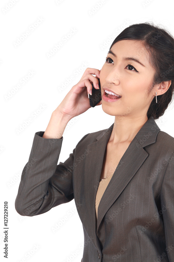 Asian Business woman talking on the phone Asian Business woman talking on the phone