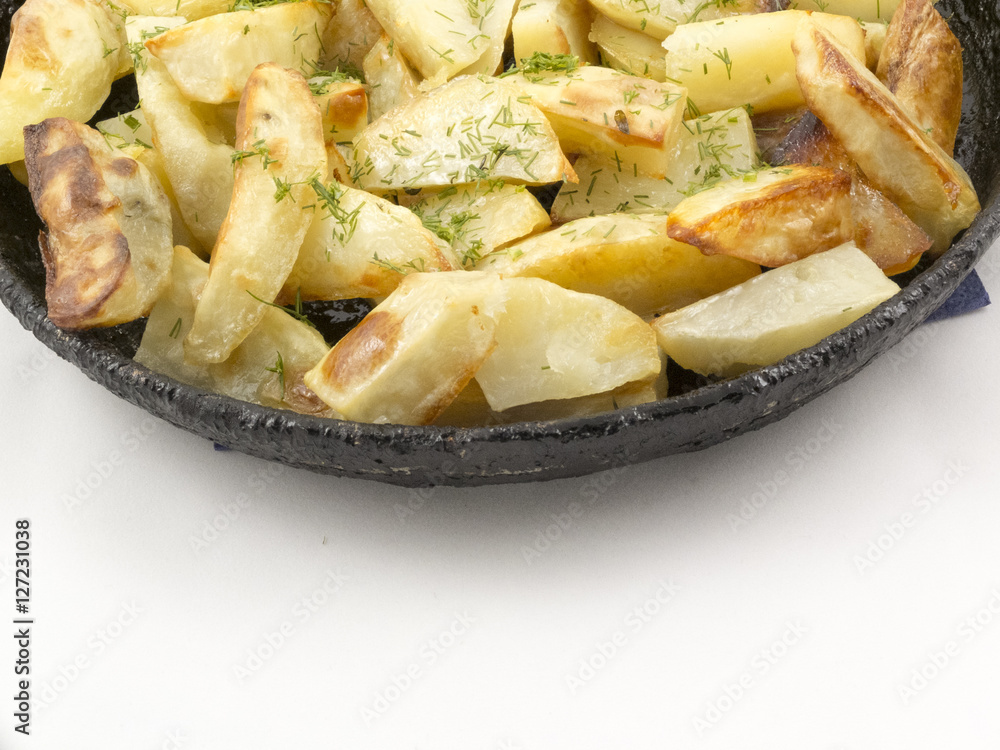 Potato wedges in the pan Potato wedges in the pan