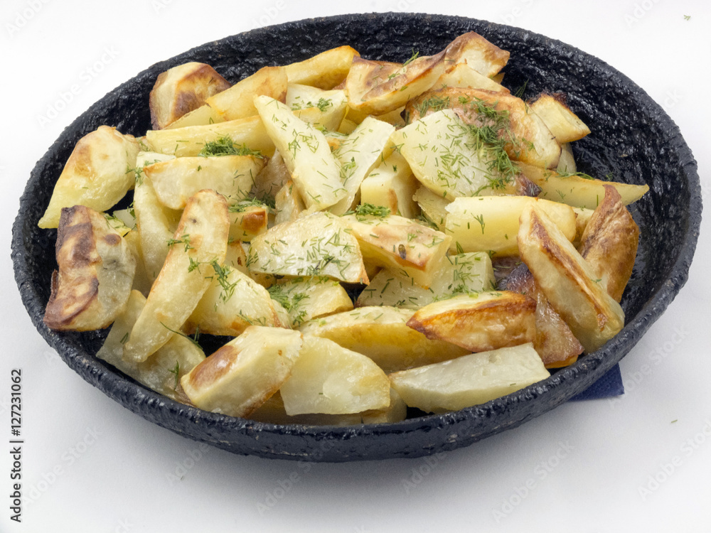 Potato wedges in the pan Potato wedges in the pan