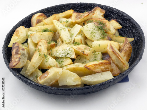 Potato wedges in the pan