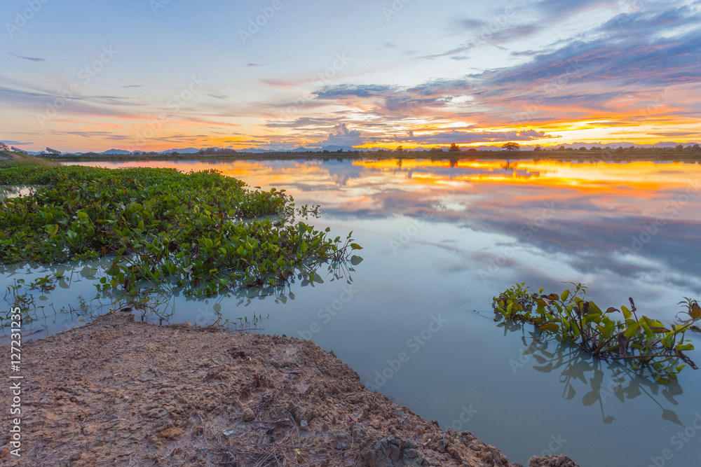 Sunset over lake at countryside