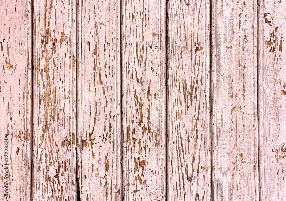 Texture of planks of old pine wood with peeling paint