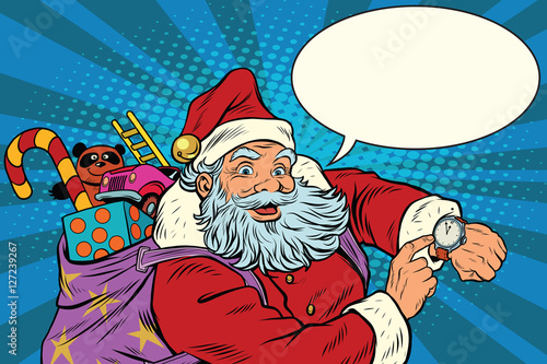 Santa Claus shows on the clock, New year and Christmas